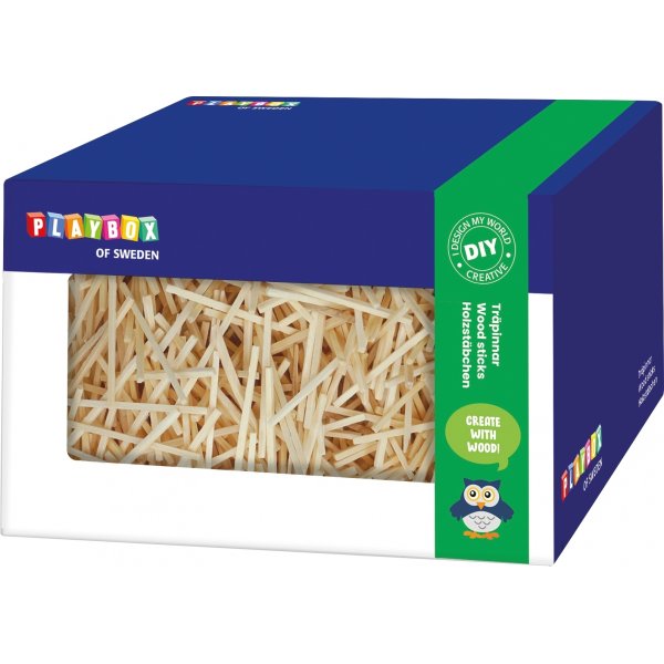 Houten stokken in een doos