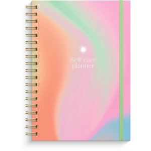 De zelfzorgplanner B5 met spiraalbinding. De zelfzorgplanner B5 met spiraalbinding.