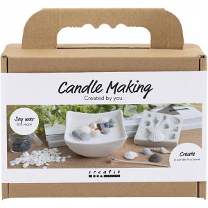 Mini DIY-kit voor het gieten van kaarsen in de vorm van een schelp, gemaakt van sojawas, grijs en gebroken wit. Mini DIY-kit voor het gieten van kaarsen in de vorm van een schelp, gemaakt van sojawas, grijs en gebroken wit.