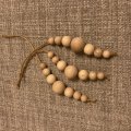 Klant imago Onbehandelde houten balletjes 15 mm � 4 mm - 18-pack. met gaten