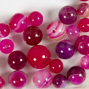Agaatkralen roze 10x10-15x6 mm - 28 stuks. Agaatkralen roze 10x10-15x6 mm - 28 stuks.